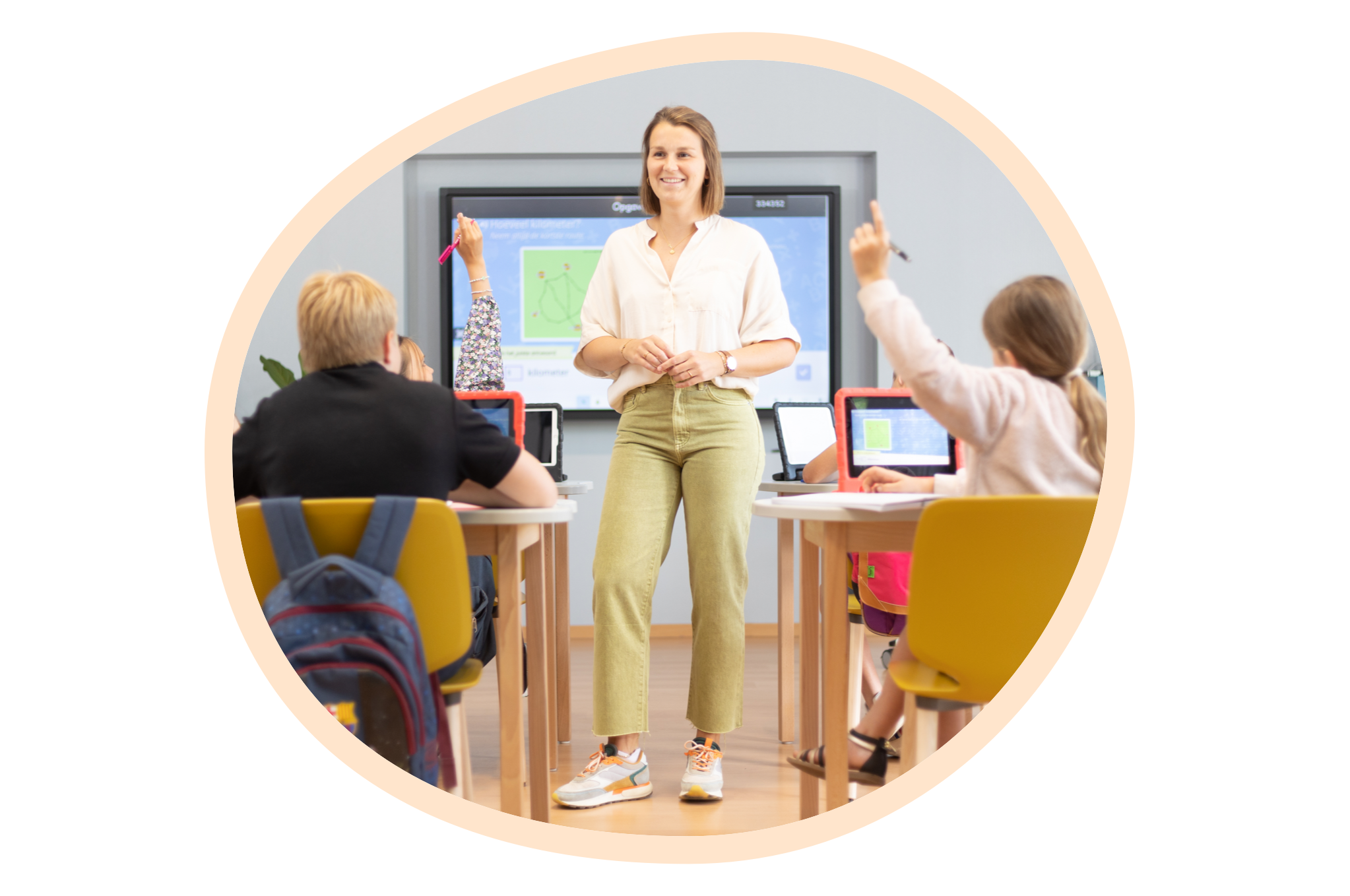 pebble with teacher stand in front of class